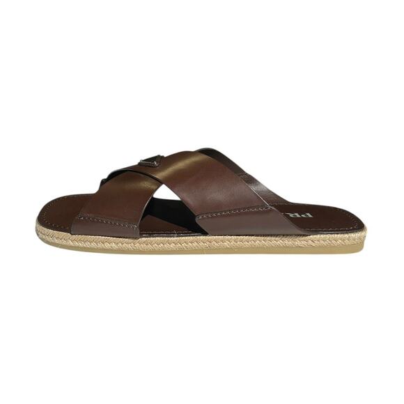 $975 crisscross raffia leather logo sandal - Picture 1 of 5